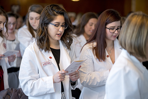 SXU Nursing student during the white coat ceremony