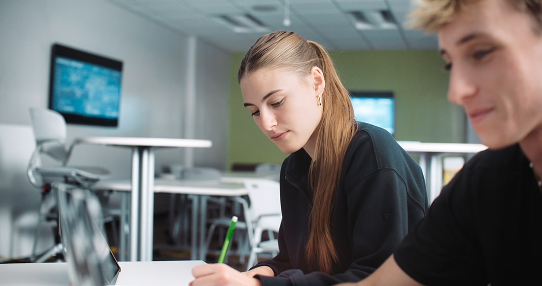 Girl and boy working on class assignment