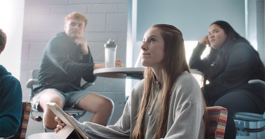 Girl reacting to question in classroom